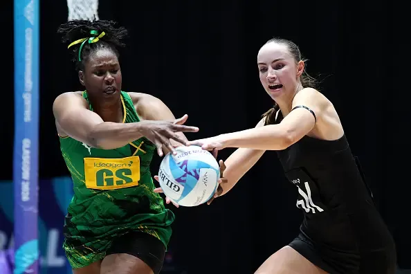 Silver Fern Kelly Jackson (right) competes for the ball against Jamaica\\'s Romelda Aiken. Photo: Getty Images
