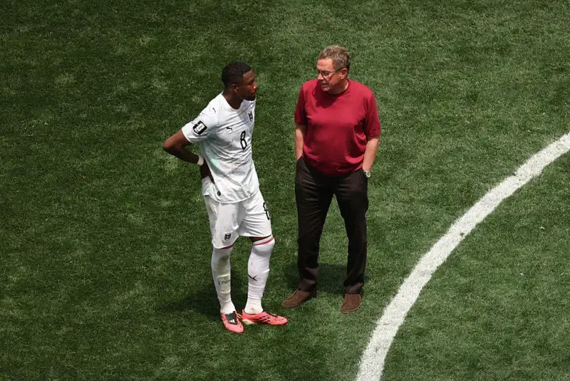 Ralf Rangnick, Head Coach of Austria, speaks with David Alaba #8 after a 0-3 loss during the FIFA World Cup 2026 Round of 32 match between Spain and Austria at Los Angeles Stadium on July 02, 2026 in Inglewood, California.
